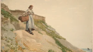 籠を運ぶ少女