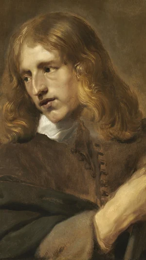 A Young Man Holding a Staff