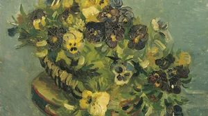 Basket of pansies on a small table