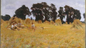 Reapers Resting in a Wheat Field