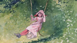 Niña en un columpio