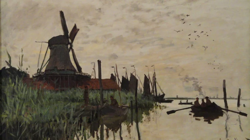 Molino de viento y barcos cerca de Zaandam