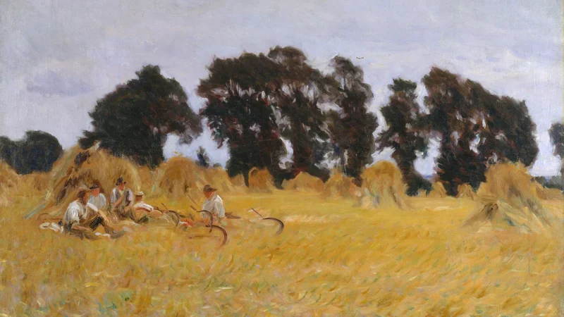 Segadores descansando en un campo de trigo