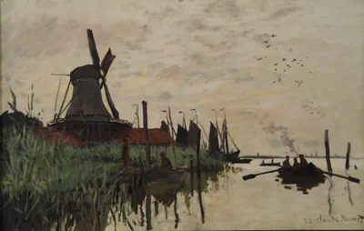 Molino de viento y barcos cerca de Zaandam